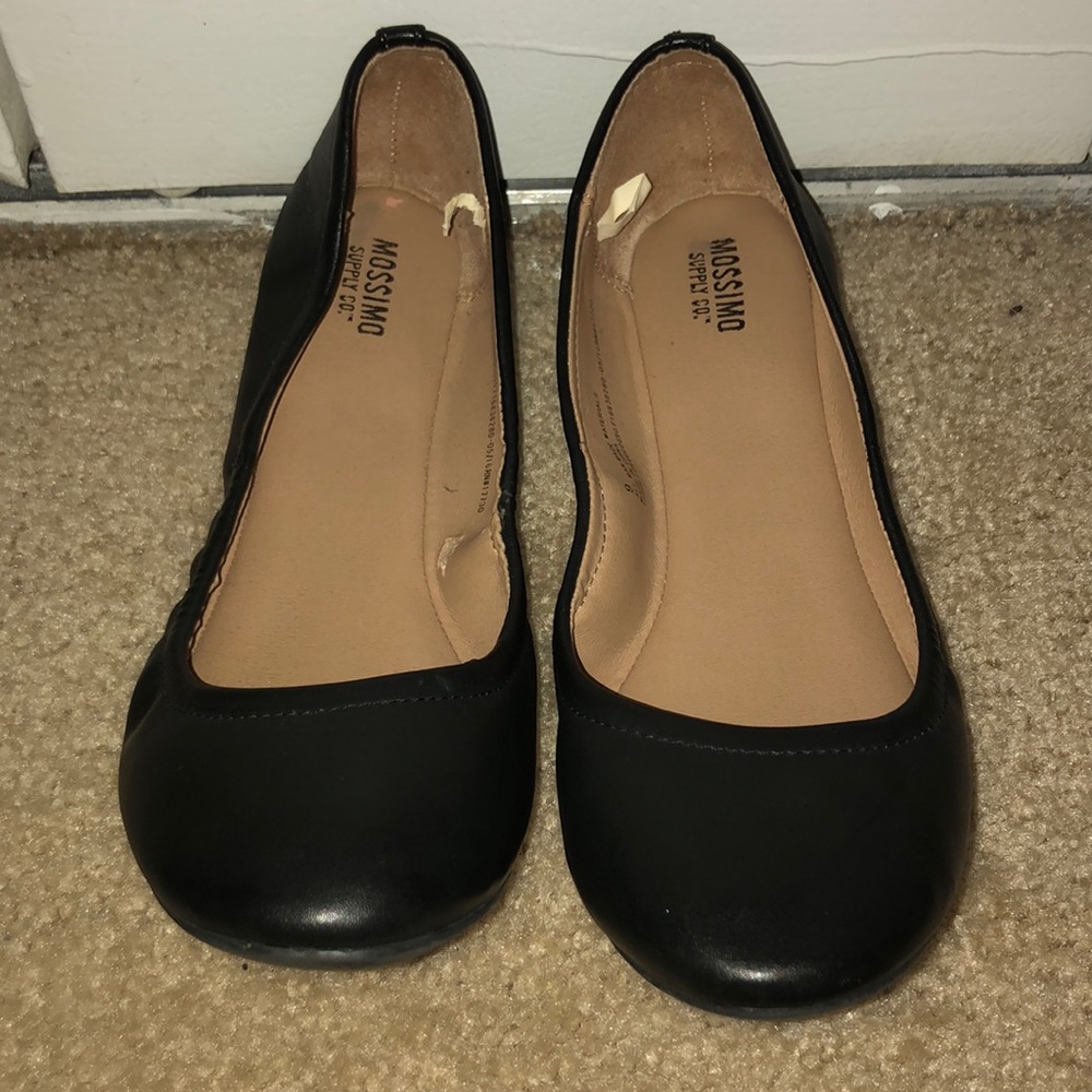 Gently worn black flats